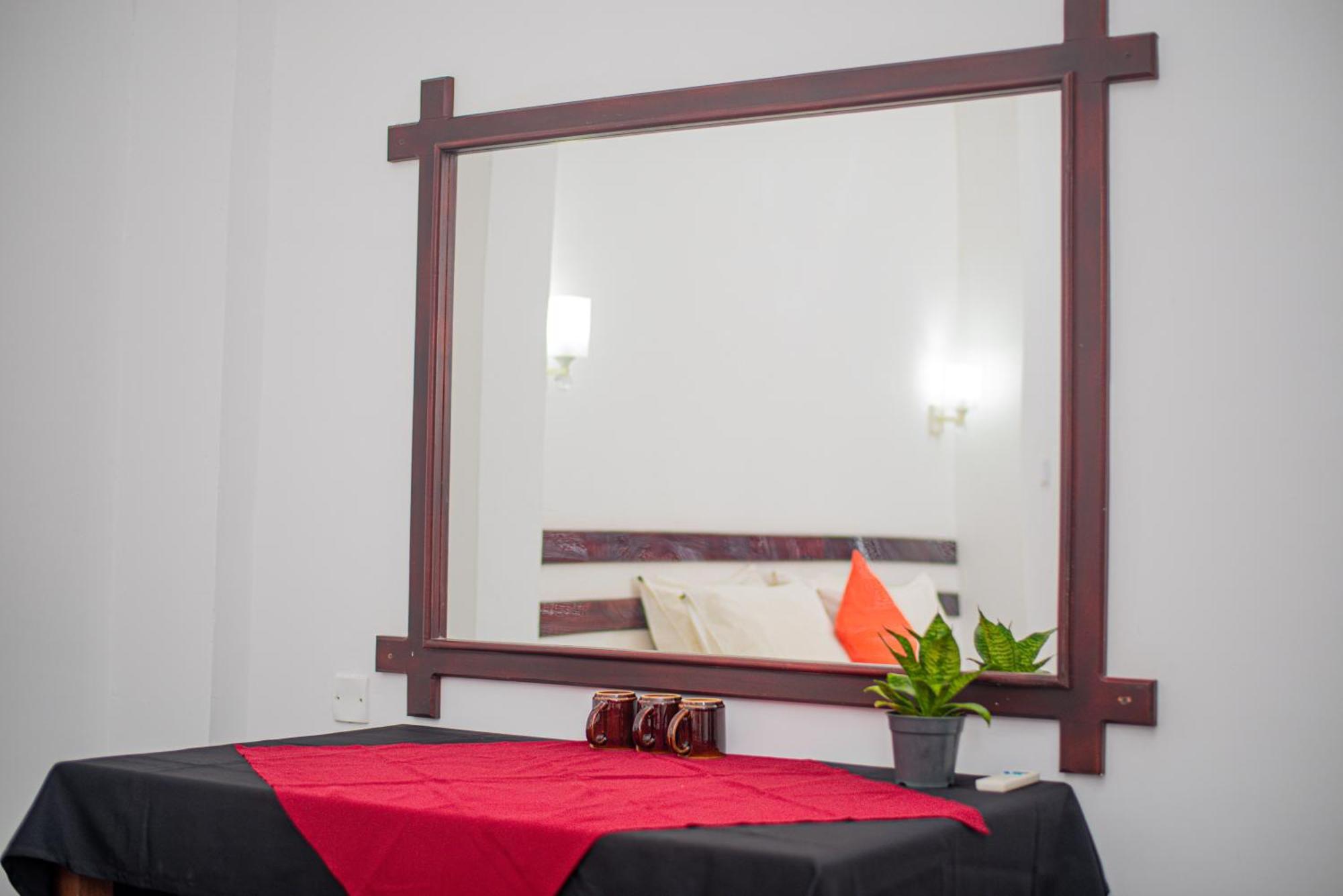 Sundowners Guesthouse Хиккадува Номер фото